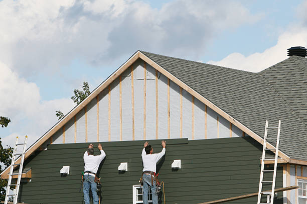 Professional Siding technician working in Berthoud, CO